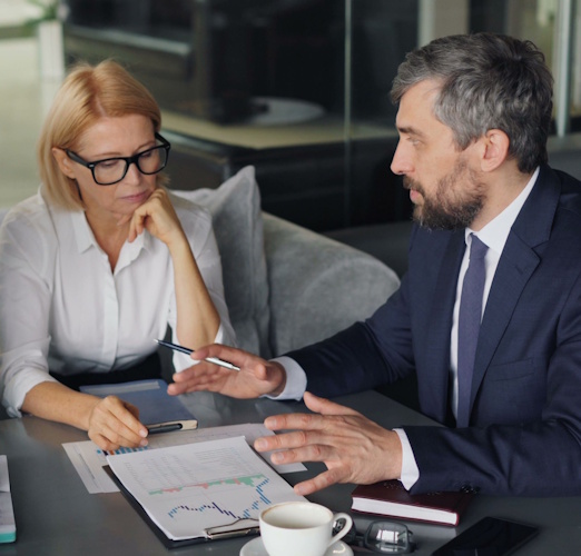 Photo of a one-on-one meeting in a business-like but intimate setting
